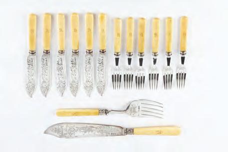 A SET OF SIX EDWARDIAN SILVER FISH KNIVES AND FORKS, with engraved decoration and ivory handles by Pinder Bros, Sheffield 1906, together with a pair of matching fish