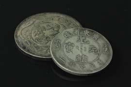 Page: 42 407 2 Pc Chinese Silver Coins Two pieces of Chinese silver coins; comprised of two Guangxu Yingbi mark coins;