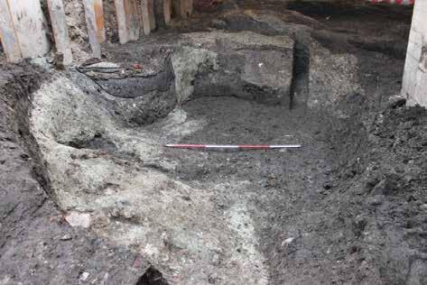 The backfills in the moat may have been somewhat 'sanitised' by this time, whereas the material dumped into this pit was fresh 'unclean' waste, which required burying.
