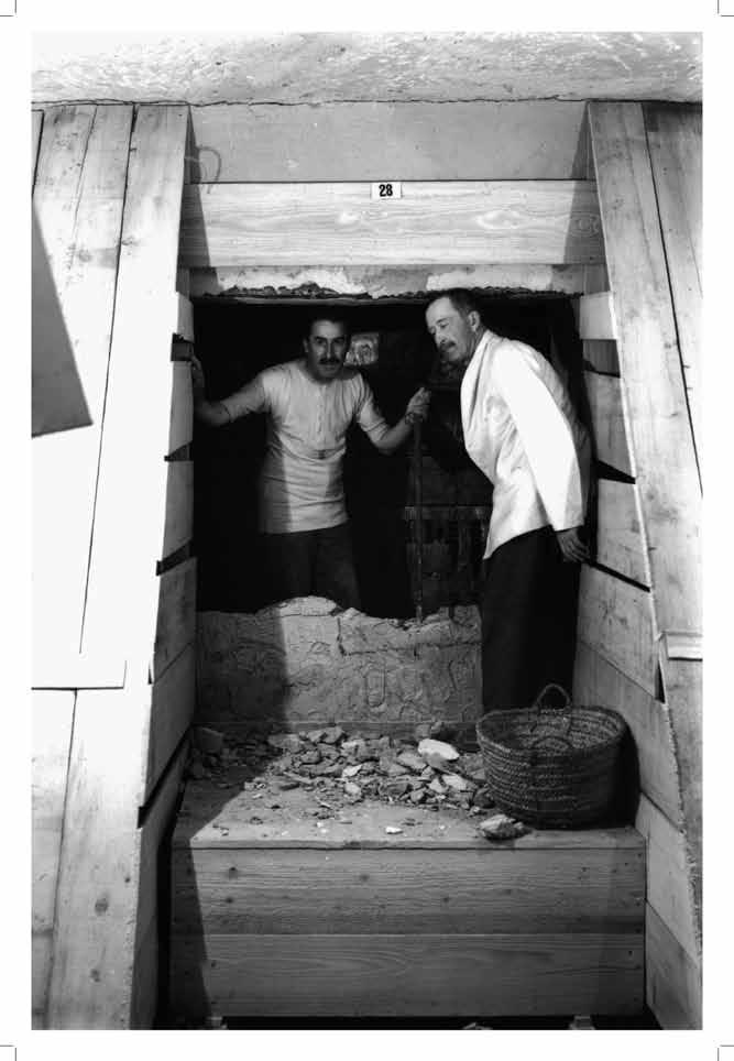Removal of the blocking of the doorway into the Burial Chamber, with Howard Carter (on left) and Lord Carnarvon On Friday, February 16, 1923, in the presence of assembled distinguished guests, Howard