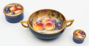 300-400 472 A small group of Royal Worcester porcelain each painted with fruit on a mossy ground and with a powder blue exterior, comprising a