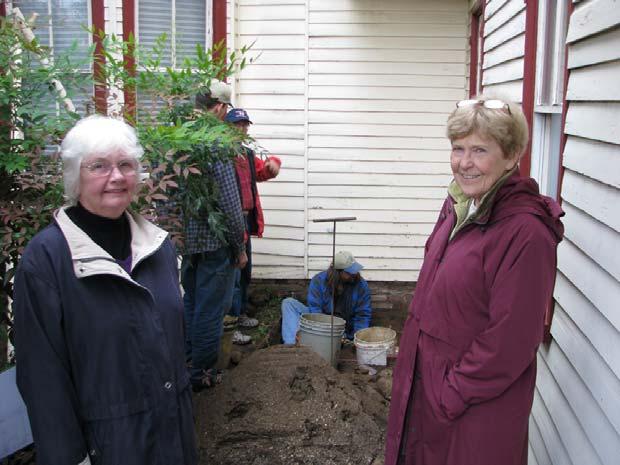 Figure 18-Sands House property owner Ann Jensen (left) and local historian Jane McWilliams inspect excavations.