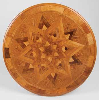 The top with inlaid geometric starburst pattern in multiple NZ timbers with background diamond form