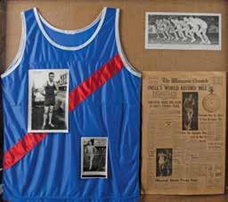 $10,000-20,000 798 Framed Peter Snell 1993 Wanganui Memorial Singlet framed together with a signed photo of the runners from the world record mile at Wanganui in 1962, two other photos of Snell and