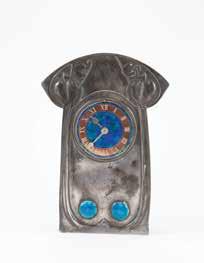 height $4,000-6,000 908 David Vessey For Liberty & Co, Cymric S/S & Enamel Mantel Clock dial marked Tempus Fugit with stylised tree above in