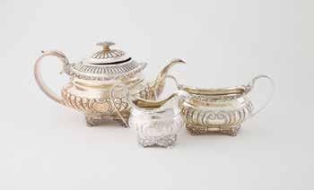 floral top scroll feet, London 1820 & 1822 $1,200-1,600 932 Fine & Large Early Vict S/S Spirit Kettle the fixed handle with carytid supports, domed lid with melon and leaf cast finial, bird form