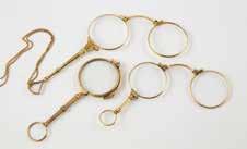 1140 Late C19th 14ct Gold Framed Lorgnette magnifying lenses on 9ct fine muff chain $350-600 1141 Pair Edwardian 9ct Gold Lorgnettes 1142 Vict Gold Plated Lorgnettes with fixed rim handle.