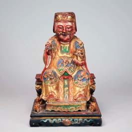 4 129 x 34 106 Gilt Polychromed Wood Ancestor Figure Dressed in elaborate robes heavily patterned with phoenixes, the smiling