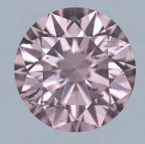 A similar absorption feature at this wavelength is responsible for the color in most natural-color pink diamonds, both (nitrogen containing) type I and (nitrogen free) type II stones (see, e.g., Collins, 1982; King et al.