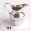 91 97 92 Edward VII small Birmingham silver cream jug with raised