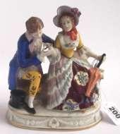 200 Collectables 203 201 Richly decorated Chelsea Porcelain group of a Lady and Gentleman