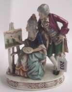 100-200 205 Porcelain group of a seated Lady and Gentleman playing a game of chess, in