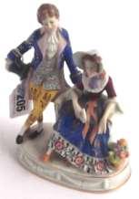 200-300 Richly decorated porcelain group of a seated lady with gentleman in 18th century