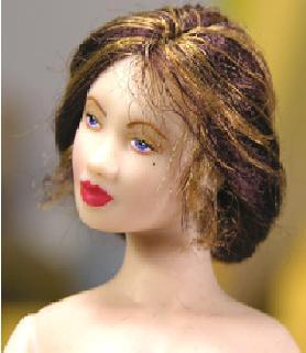 With added curls she would adapt well as a period doll.