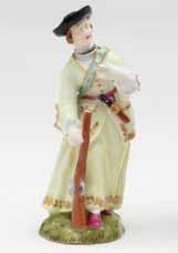 A Meissen miniature figure of a sportswoman, wearing a yellow skirt, green hunting coat and black tricorn hat, and mounted on a grey prancing horse, on oval gilt bordered mound base, 3 high, circa