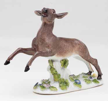 30. A Meissen model of a prancing deer, modelled by J J Kaendler, circa 1758, finely naturalistically decorated in