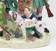 duck, and with two young boys with a hound and a piglet to her right, decorated in coloured enamels, the mound