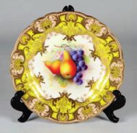 5cm high. Realised 1500 40 Pair early 20th Century Royal Worcester cabinet plates, centre panels painted with fruit and signed A.