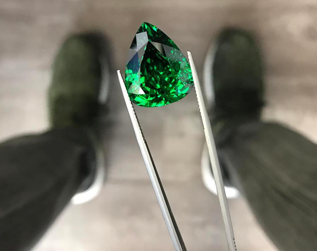 Above: Dave in his signature Instagram pose, matching his sneakers with a 19.0+ ct. tsavorite Garnet from Kenya. explore the peripheral aspects of the colored stone industry.
