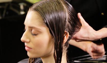 treatment product and gently squeeze the hair to ensure saturation.