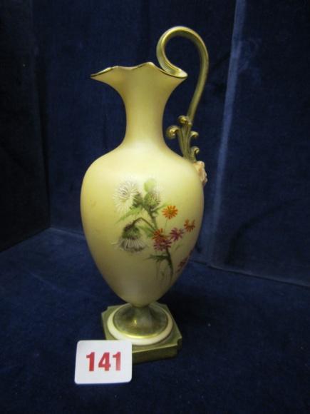 handle ewer, with green and gold decor to handle and