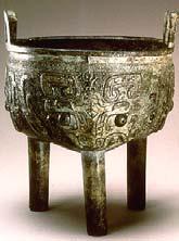 and principled style characteristic of late Western Zhou bronzes.