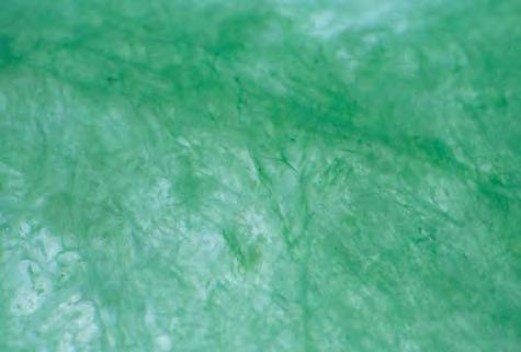 Of particular concern was the identification of dye in a green jadeite bangle that did not show the typical dye band with the handheld spectroscope (Johnson et al., 1997).