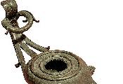CULTURAL OBJECTS AT RISK Lamps: Bronze and terracotta lamps with rounded bodies and a hole on the top, hollowed nozzle and looped handles or lugs.