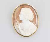J259 Cornelian Carved Cameo Brooch in ornate silver filgree frame shaped as a tiara J260 Mid C20th 9ct Cameo Brooch high relief carved