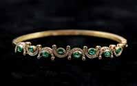 set pear cut bright green emeralds, all pave surround of diamonds 03 Ins $4,200