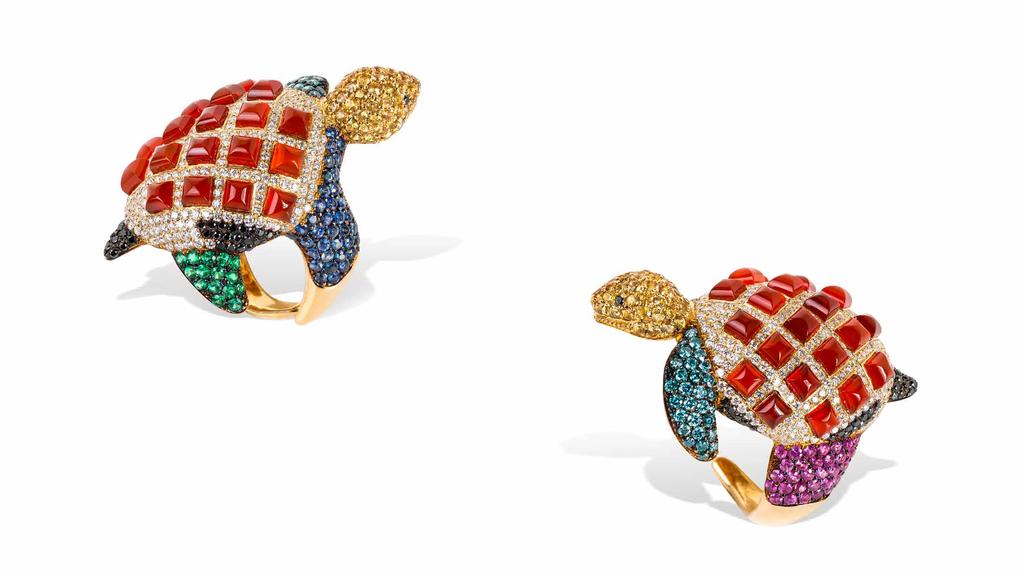 This embellished turtle ring will get you noticed and is made with yellow gold, Cornelian agate, diamonds, sapphires and emeralds.