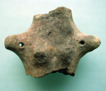 Its cylindrical shape suggests a Vinča A stage, but the nape pulled backward has correspondents at Balta Sărată, Zorlenţu Mare and other places 230. The second (fig. VI.