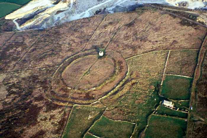 Castle an Dinas, West Penwith. Faint traces of a circular banked enclosure lie inside the circuit of innermost rampart of the Iron Age hillfort.