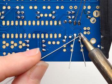 Check your work - then clip the leads. Next is the ceramic capacitor.