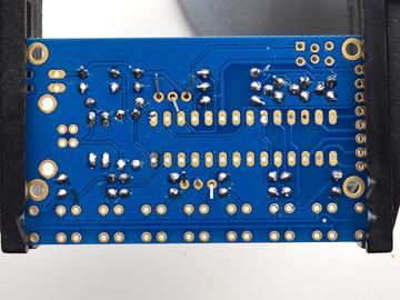 speed. Flip over the board and solder in both 3-pin components.