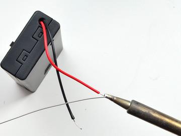 Use your soldering iron and a small amount of solder to tin the wire by melting a little solder