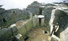 By AD100 the Bu roundhouse had fallen out of use, Interior of Midhowe Broch, Rousay perhaps after a disastrous fire, and the later houses were of much poorer quality.