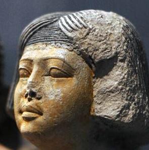 His wife is wearing a long Tunic and a headdress as clear in her zoomed image. The overall height is 545 mm [43]. Fig.24 Limestone group statue of Penmeru from the 5 th Dynasty [39].