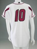 down the front of jersey Curved hemmed bottom with extended tail R RUSSELL center Color as shown: - Body and raglan sleeves White - Sleeve inserts True Red