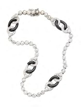 Jewellery, Silver, Watches & Wine 19 71 A diamond and onyx set bracelet composed of four onyx and diamond set oval links, the joining links millegrain set with round brilliant cut diamonds, with