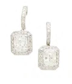 91cts 2,000-3,000 184 BOODLES - A pair of diamond set pendant earrings each claw set with a rectangular princess cut diamond, in a single border of round brilliant cut diamonds, suspended from a