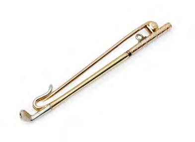 fitted box Length: 29mm 2,000-2,500 194 CARTIER - A novelty golf tie pin modelled as a golf club, with French control marks to pin, signed Cartier Paris Length: 61mm 195 GEORG