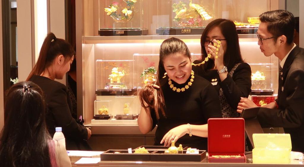 decrease and sell back to original traders when gold prices rise. Some Cambodians, particularly new generations, have turned to buying and selling gold futures.
