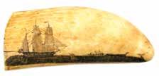 *105. A LARGE AND VERY INTERESTING SCRIMSHAW TOOTH. One side engraved with a large port view of an English ship at anchor. Nicely done with ship s figurehead shown and flags flying both fore and aft.