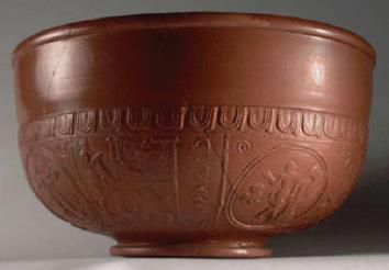 France). The external pattern was formed by pressing clay into a decorated mould, and the inside was made smooth using a potter s wheel.