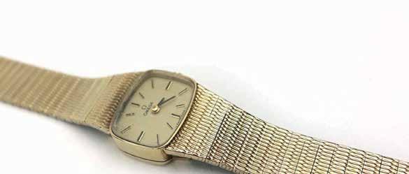 gentleman's Seamaster quartz wristwatch by Omega, the square cushioned dial with baton numerals and date aperture on an articulated bracelet strap 80-120 903 A part 9ct yellow gold ladies 'Golden