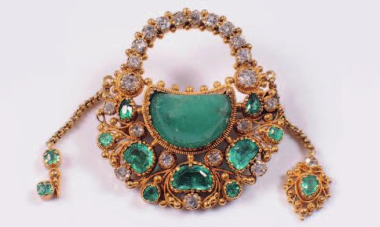 diamonds, oval and demi-lune emeralds and later cabochon emerald centrestone, the reverse with hair compartment. 800-1000. 168.