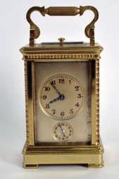 319 FRENCH BRASS BOUND CARRIAGE CLOCK with alarm/ repeater, central and subsidiary dial, black &