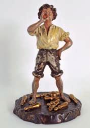 320 AUSTRIAN COLD PAINTED BRONZE FIGURE OF A BOY modelled standing upon a base with fallen