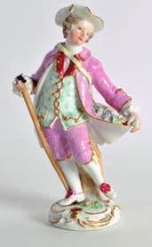 25ins wide. 450 AN 18TH CENTURY MEISSEN FIGURE OF A YOUNG MAN modelled holding a stick and carrying flowers within his coat. 5.75ins high.